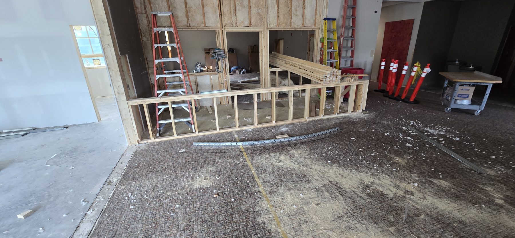 Commercial buildout wood framing before drywall installation by Finishing Touch, LLC in St. Paul, MN
