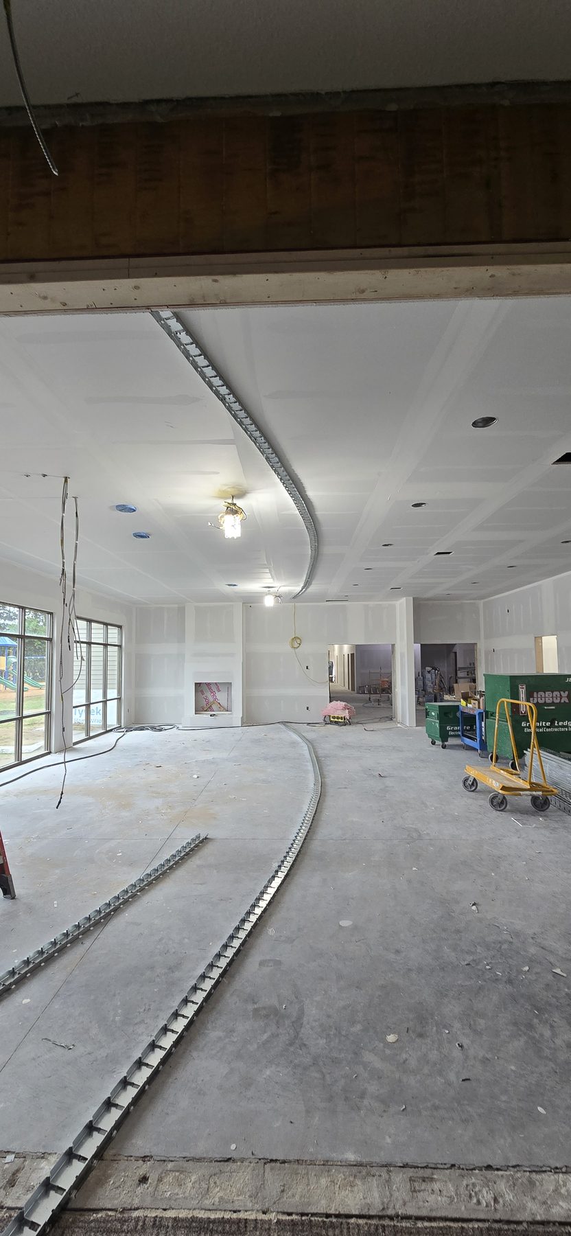 Commercial drywall curved soffit and ceiling finishing by Finishing Touch, LLC in St. Paul, MN